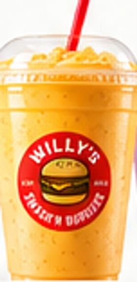 Mango smoothie in a Willy's cup with a red straw