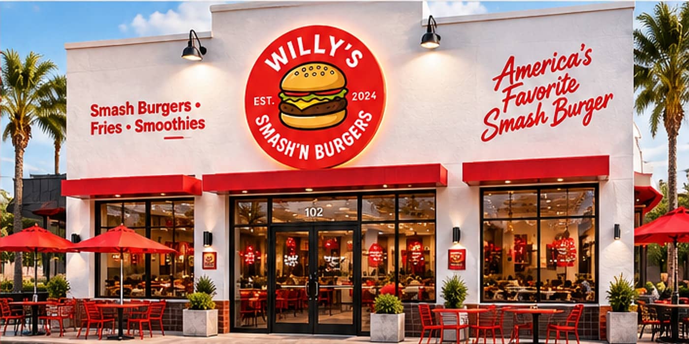 Willy's Smash'N Burgers restaurant exterior with palm trees, red umbrellas and outdoor seating
